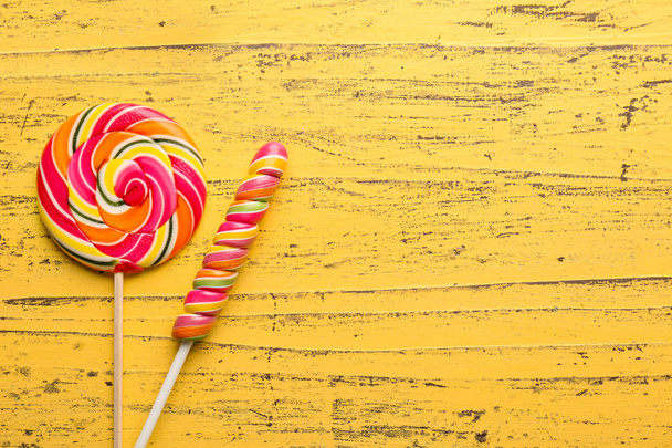 Composition with tasty lollipops  - Φωτογραφία, εικόνα