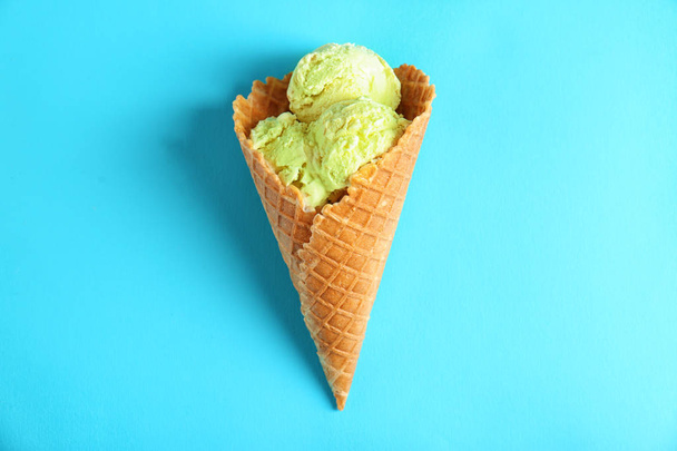 Pistachio ice-cream in waffle cone  - Photo, Image