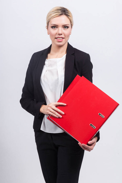 Business lady in suit with office folders - Photo, Image