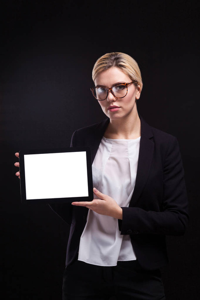 Young businesswoman holding tablet  - Foto, Imagen
