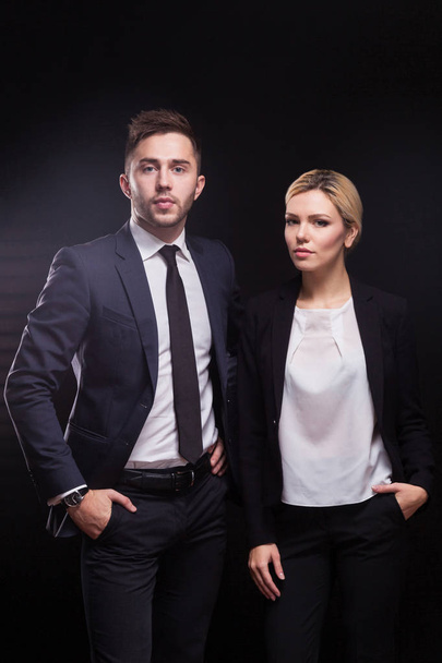 Young confident businessman and businesswoman - Photo, Image