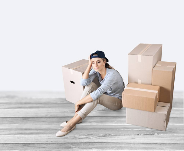 young woman with cardboard boxes - Фото, зображення