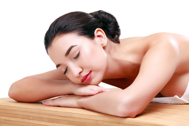 Young beautiful asian woman relaxing at spa salon - Фото, изображение
