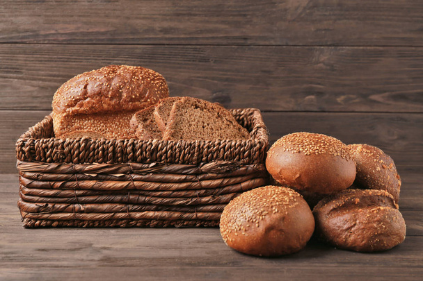 Wicker basket with fresh bread   - Фото, изображение