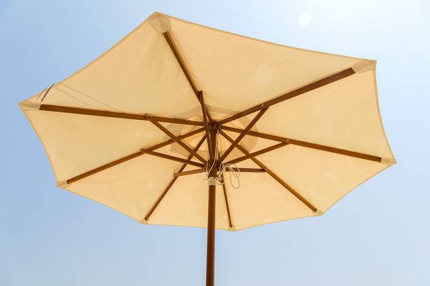 parasol over blue sky - Photo, Image