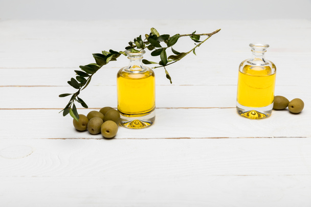 Olives and essential oil - Photo, Image