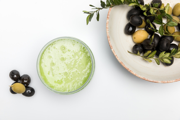Organic cream and olives - Фото, зображення