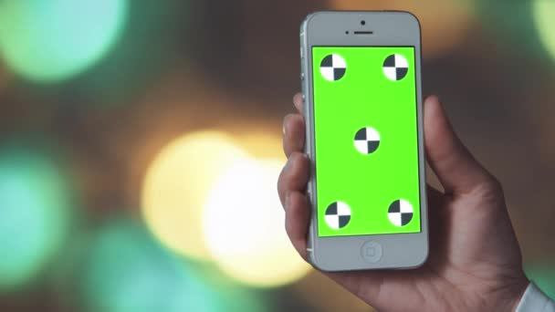 Smartphone-val Bokeh háttér előtt a Green Screen - Felvétel, videó