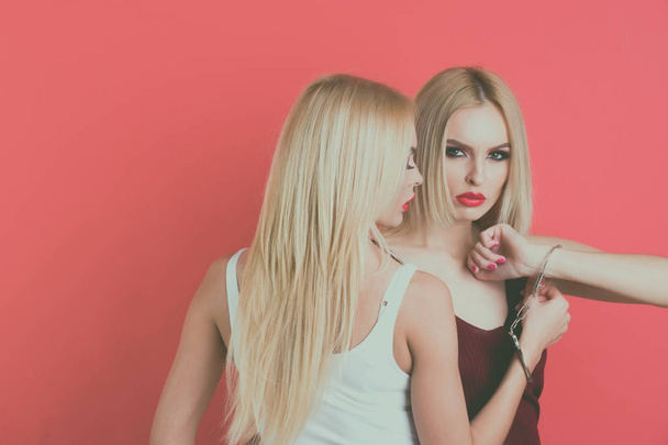 fashion twin girls or beautiful women friends with blonde hair - Foto, Imagem