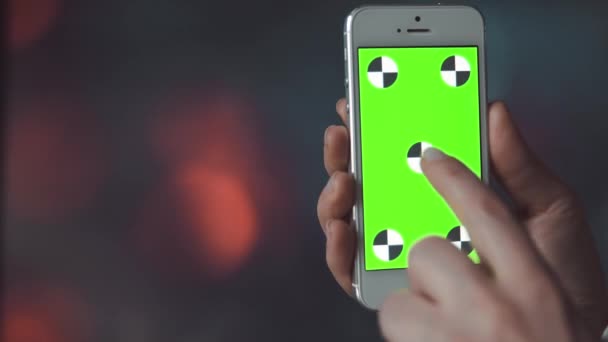 Smartphone-val Bokeh háttér előtt a Green Screen - Felvétel, videó