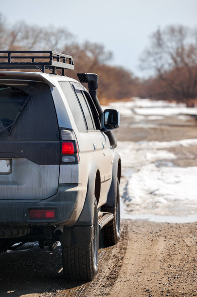 Cross country vehicle on dirt road - Photo, image