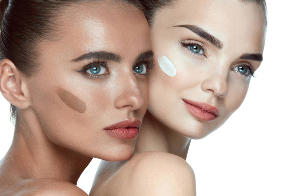 Beauty Faces. Beautiful Women With Makeup And Cream On Skin - Fotó, kép