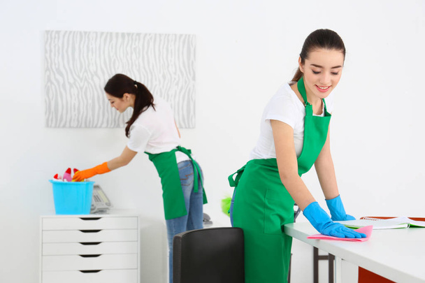 Cleaning service team at work in office - Photo, Image
