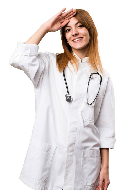 Young doctor woman saluting - Photo, Image
