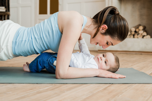 Woman with her son during workout - Photo, Image