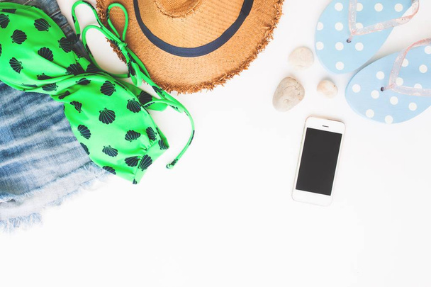 Flat lay of beach items and smart phone, Summer  concept on white background with copy space, Top view - Fotó, kép