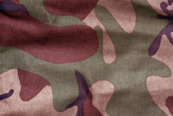 Weathered camouflage uniform pattern.  - Photo, Image