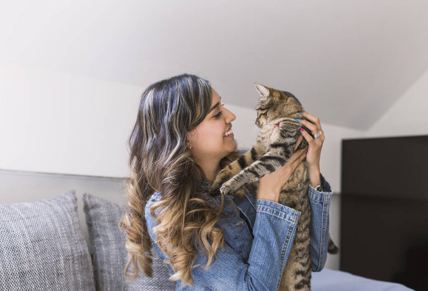 Woman portrait with her cat - Photo, Image