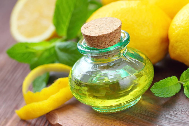 Essential aroma oil with mint and lemon - Photo, image