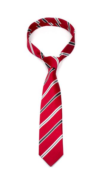 stylish tied bright red striped tie with black and white lines isolated on white background - Photo, Image