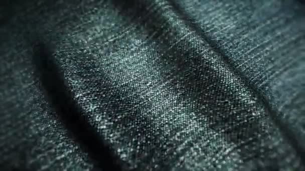 Realistische jeans zwaaiend in de wind. Abstracte achtergrond Ultra-HD resolutie. Close-up stof textuur. Naadloze lus - Video