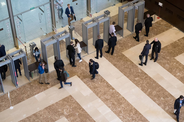 Visitors passing security check - 写真・画像