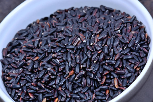 Pot with black rice on table - Photo, Image