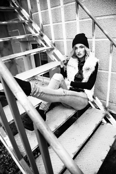 Gorgeous fashionable sexy young blonde woman street portraits. Black and white - Valokuva, kuva
