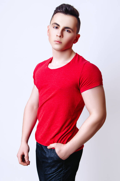 Fashion photo of young model man on white background. Boy posing. Sports guy. Studio photo. - Φωτογραφία, εικόνα