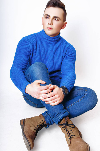 Fashion photo of young model man on white background. Boy posing. Sports guy. Studio photo. - Photo, Image