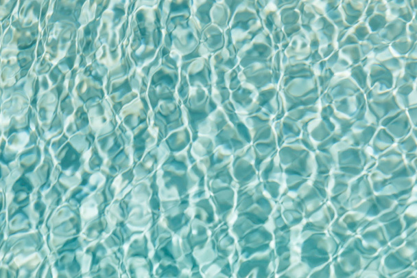 Patrones de agua en una piscina verde
 - Foto, Imagen