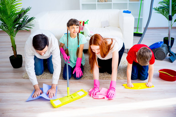 Family cleaning house - 写真・画像