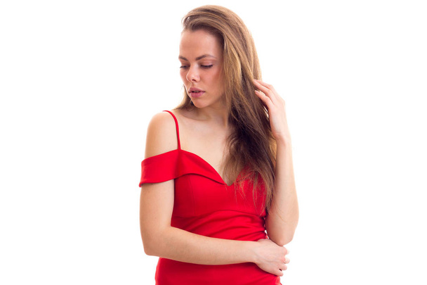 Young woman in red dress - Фото, изображение