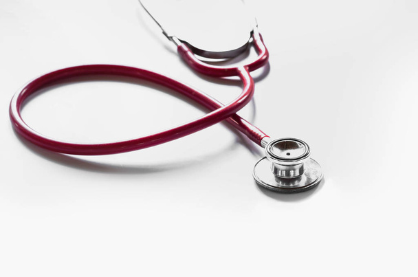 red stethoscope isolated on white background - Foto, imagen