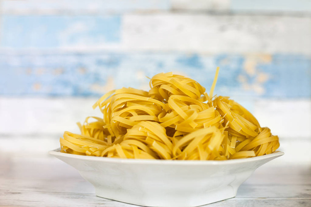 Full bowl of fresh pasta - Foto, Bild