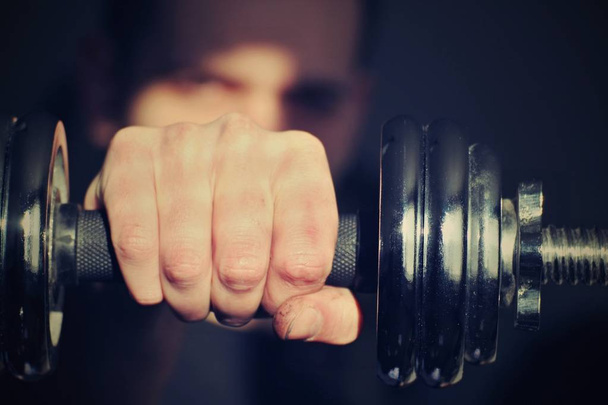 Dumbell with hand - Foto, imagen