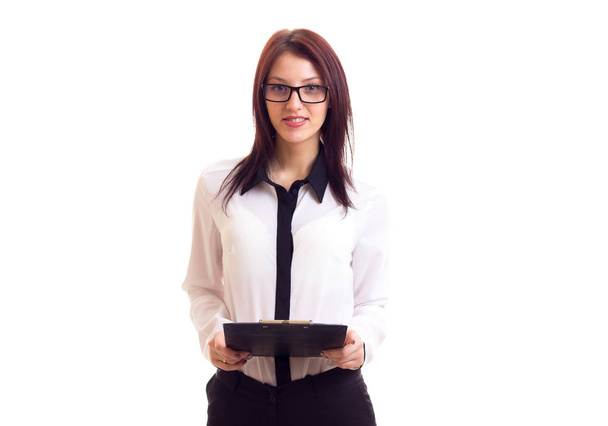 Young businesswoman holding folder - Photo, Image
