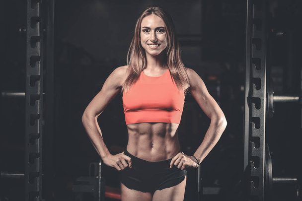 Caucasian sexy fitness female model in gym close up ab - Foto, Imagem