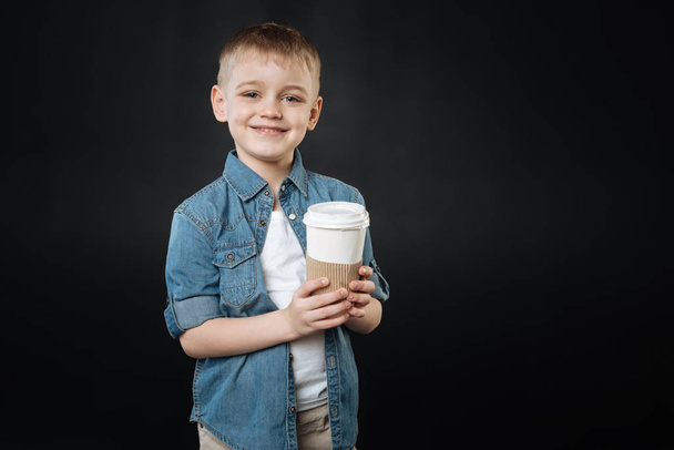 Attractive child posing with paper cup - Φωτογραφία, εικόνα