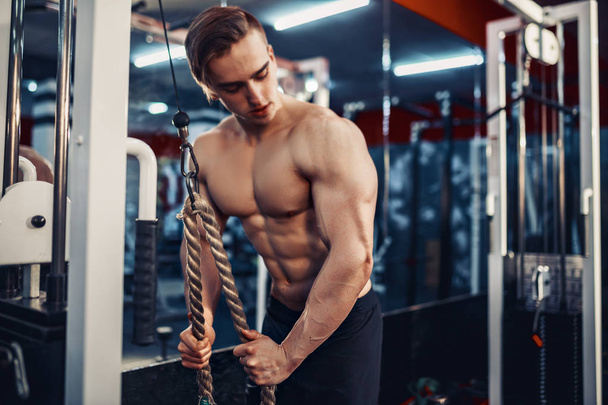 Handsome Muscular Fitness Bodybuilder Doing Heavy Weight Exercise For Triceps - Foto, Imagem