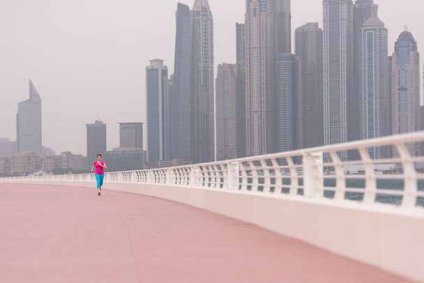 woman running on the promenade - Fotografie, Obrázek