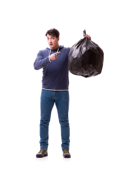 Άντρας με σακούλα σκουπιδιών απομονωμένος σε λευκό - Φωτογραφία, εικόνα