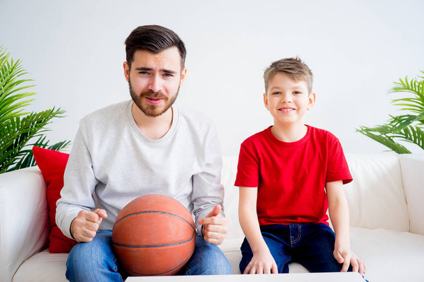 Father and son watching basketball - Photo, Image