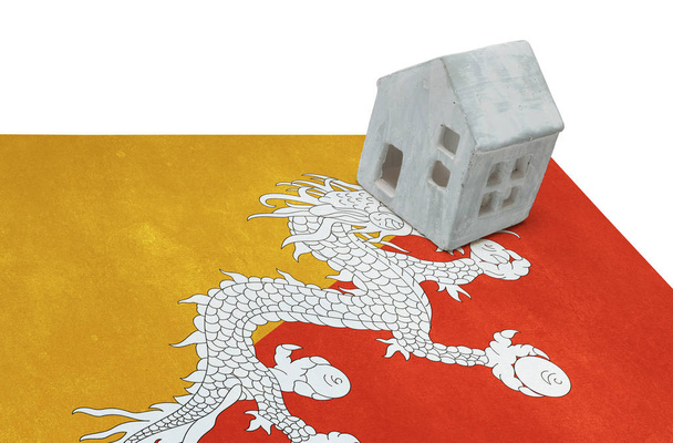 Pequeña casa en una bandera - Bután
 - Foto, Imagen