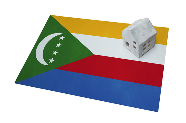 Pequeña casa en una bandera - Comoras
 - Foto, Imagen