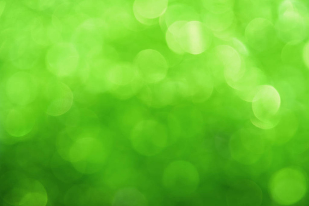 Verse groene bokeh lichten abstract achtergrond - Foto, afbeelding