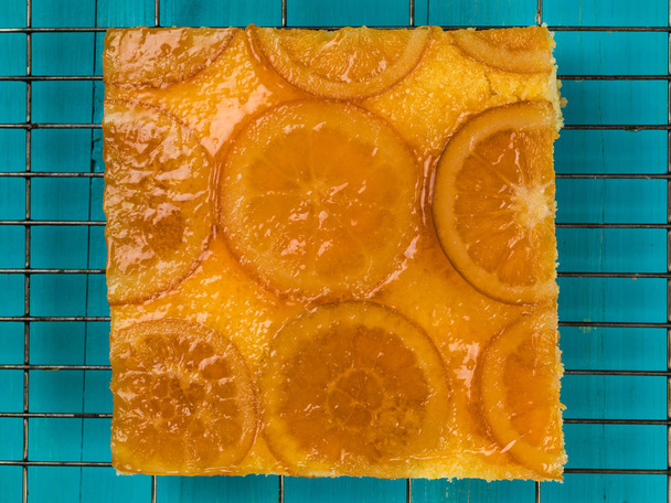 Pastel de esponja naranja acristalada
 - Foto, Imagen