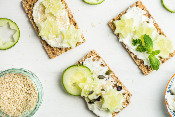 Snack from Wholegrain Rye Crispbread Crackers and Cucumber - Fotografie, Obrázek