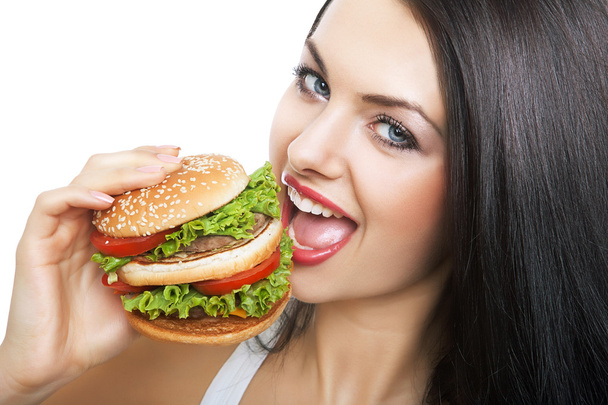 close-up portrait of girl and hamburger - Fotó, kép