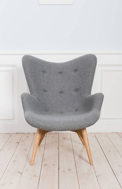 Gray armchair in the interior - Фото, изображение